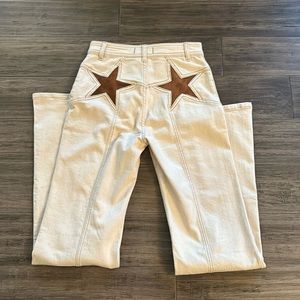 We The Free High Rise Jeans with Brown Star Patches